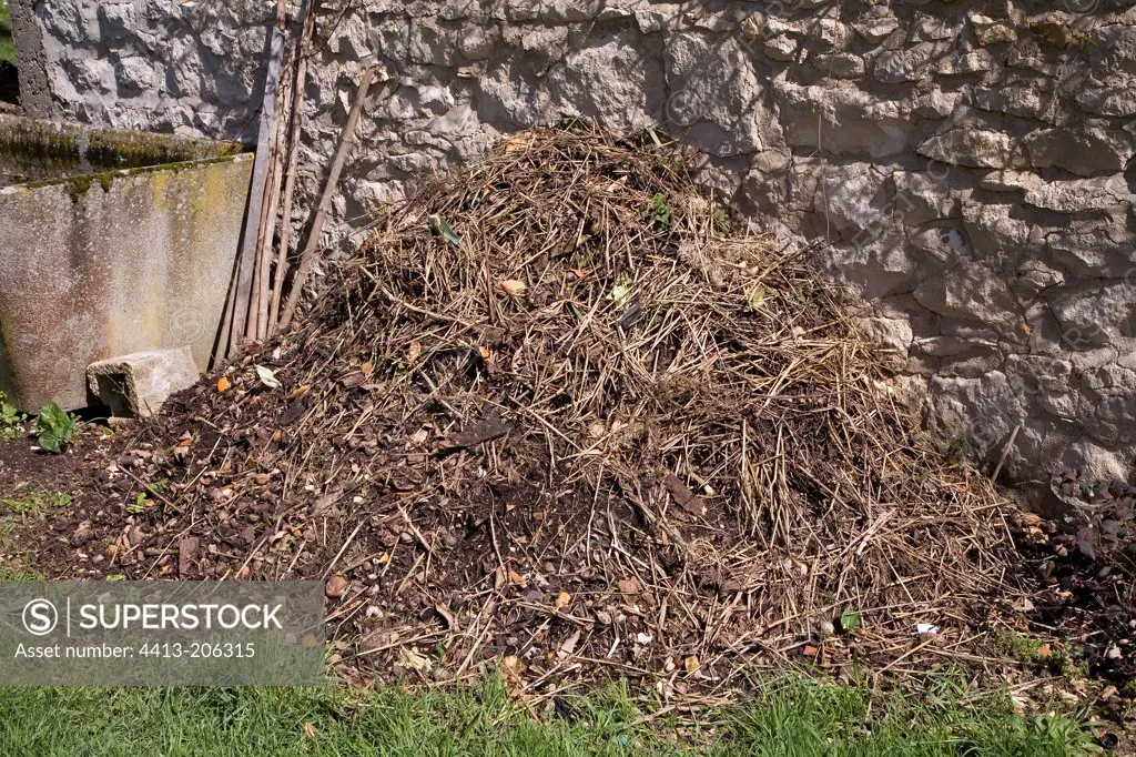 Compost Heap against a wall in a private garden France