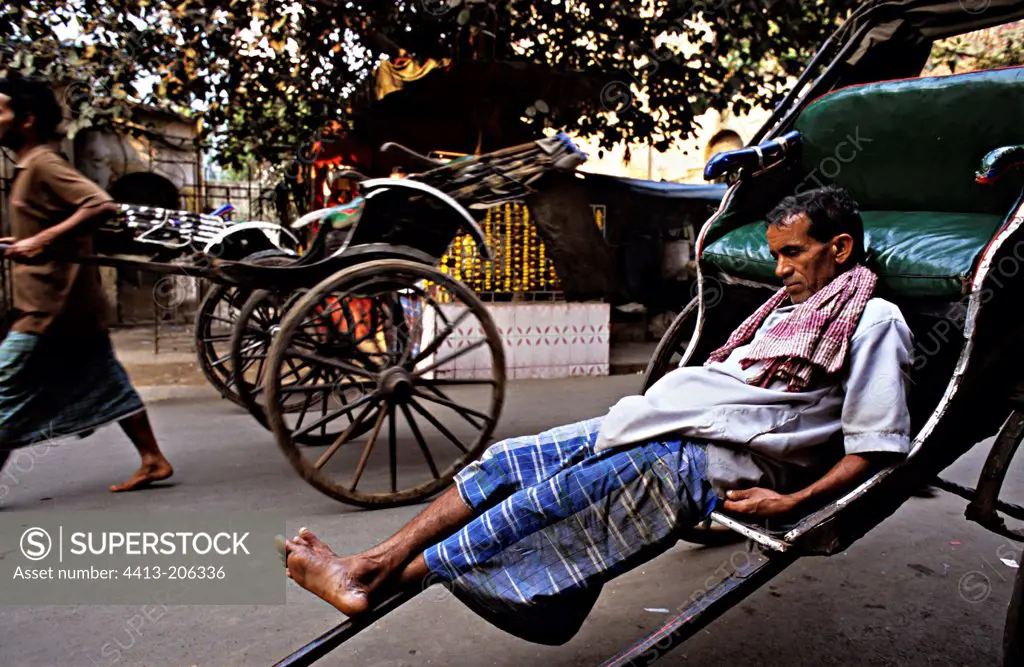 Rickshaw driver resting Calcutta India