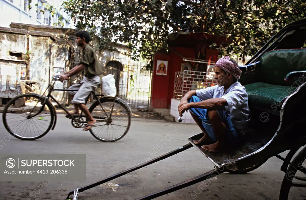 Rickshaw and cycle on the streets of Calcutta India