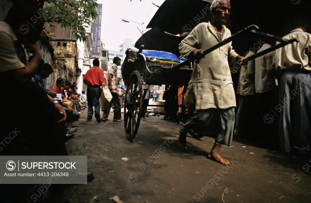Rickshaw in a market on the streets of Calcutta India