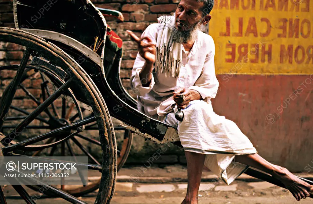 Rickshaw driver resting Calcutta India