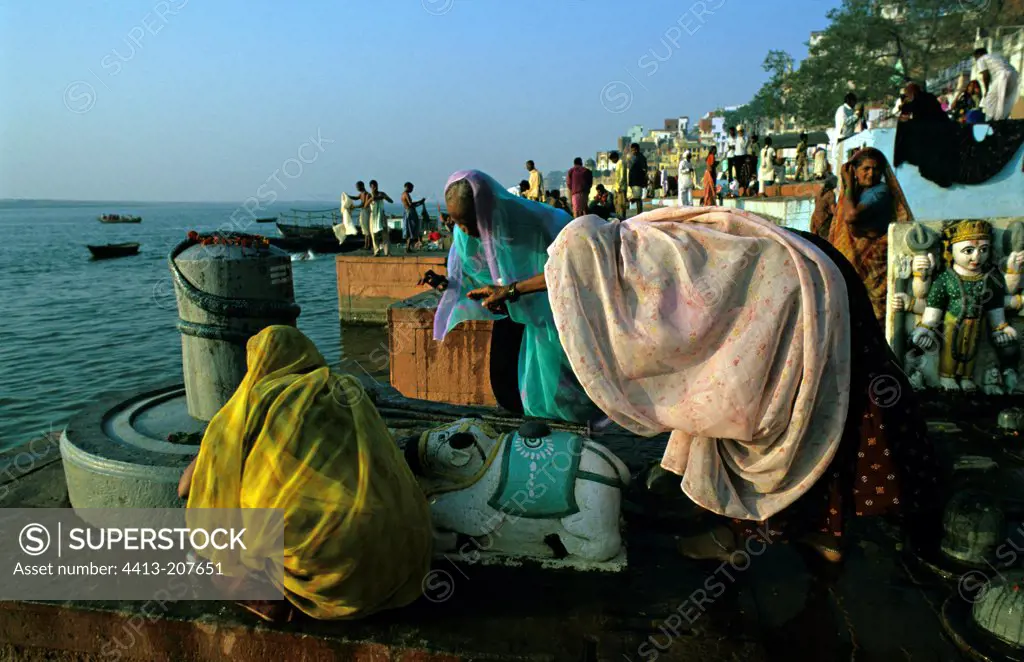 Nandi statue at the edge of the Ganges Benares India