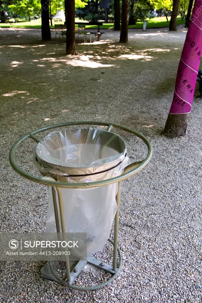 Transparent plastic dustbin in the Luxembourg Garden