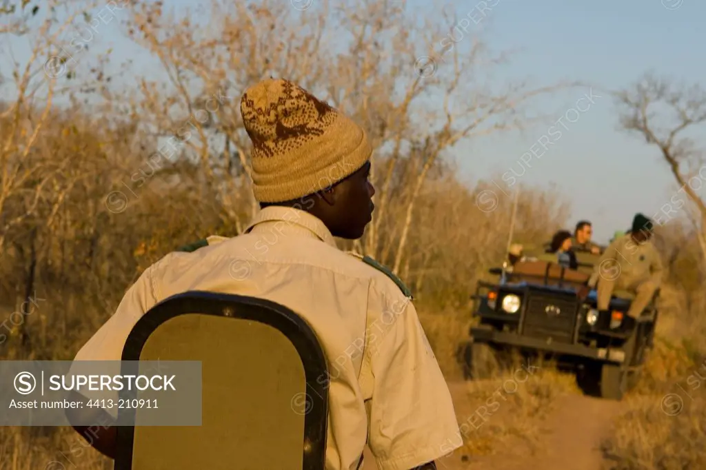 Men before the safari cars South Africa