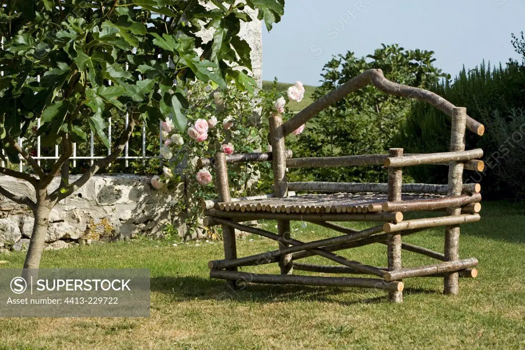 Bench in wood in a garden