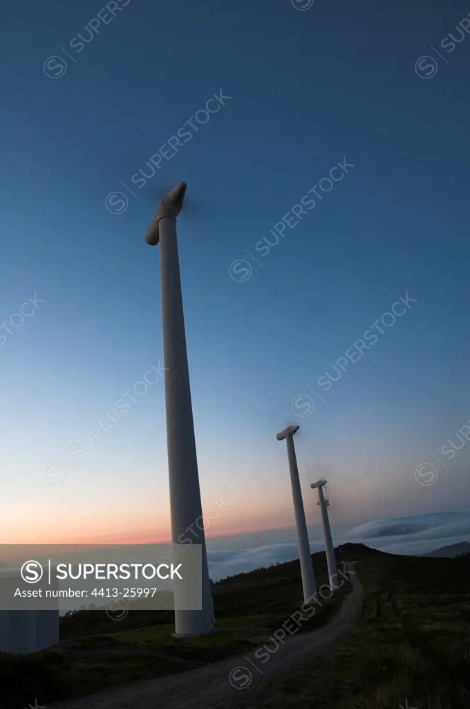 Windmills at twilight Galicia Spain