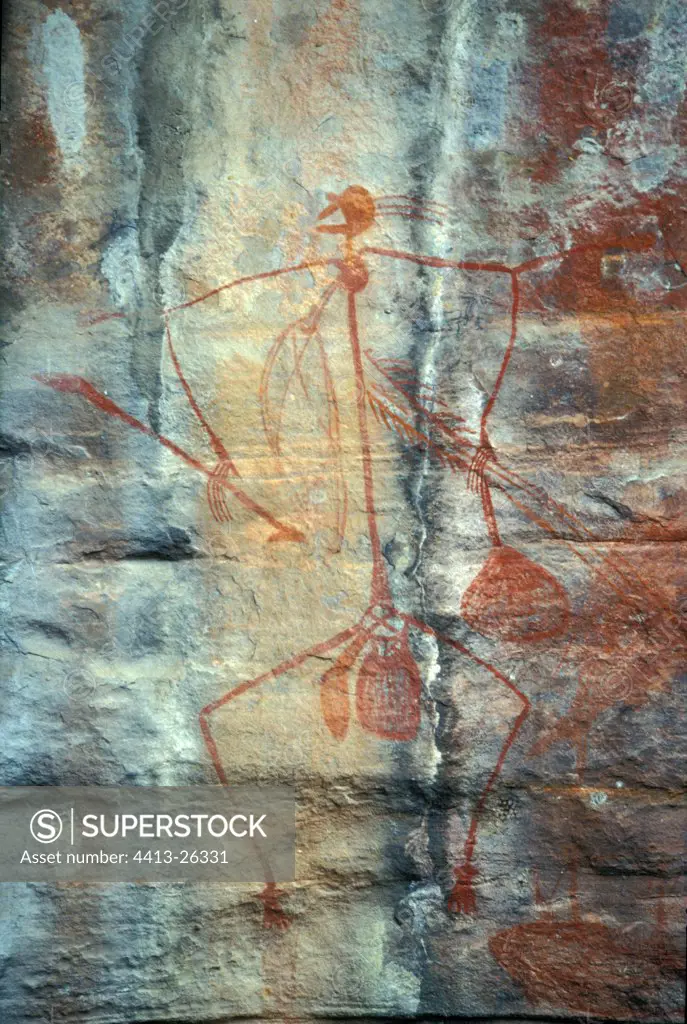 Prehistoric drawing of a man with his weapons Australia