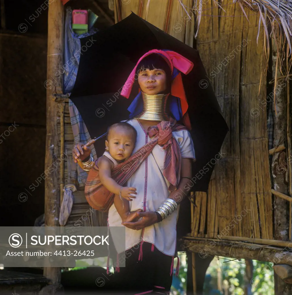 'Long-neck' woman of the Padaung tribe and her son Thailand
