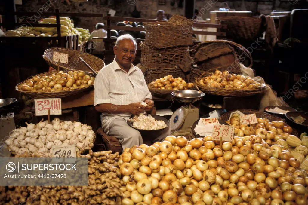 Onion salesman at Port-Louis market Mauritius