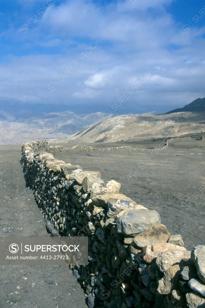 Long stone wall Mustang Nepal