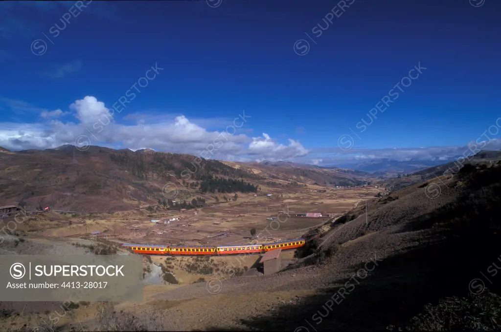 Train going on a high plateau Peru