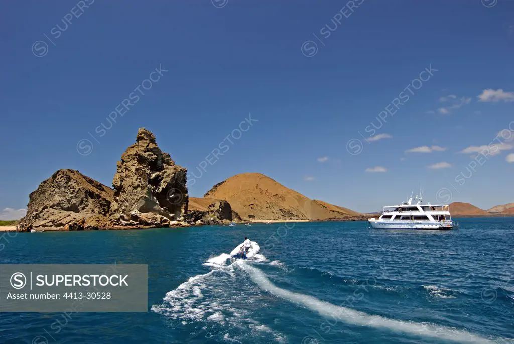 Boat bringing up tourists on bartolome Island Galapagos
