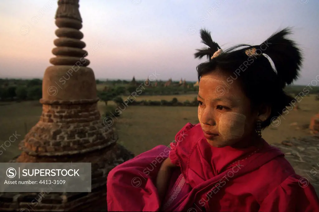 Young girl at the top of a temple of Bagan Myanmar