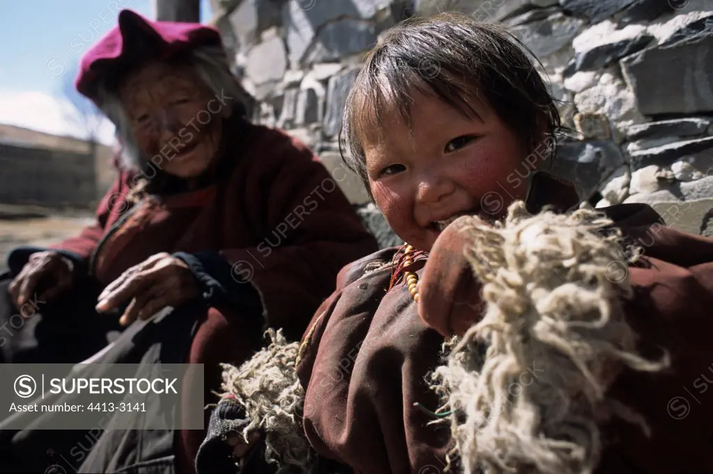 Young Tibetan girl and her grandmother Tibetan area of Kham