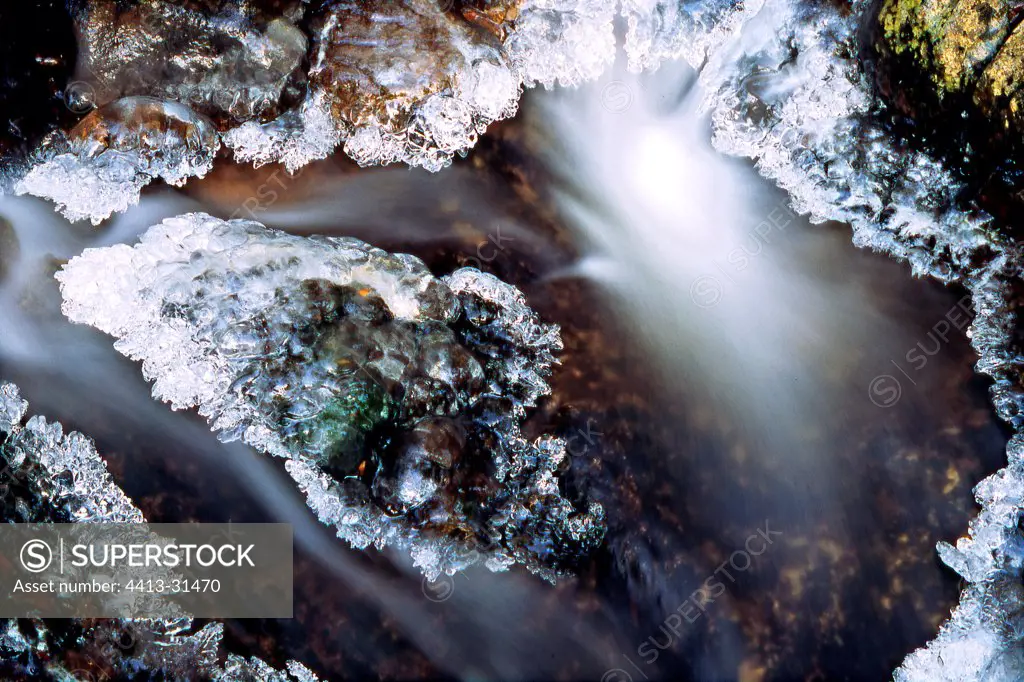 Brook made by ice in winter in the Vosges France
