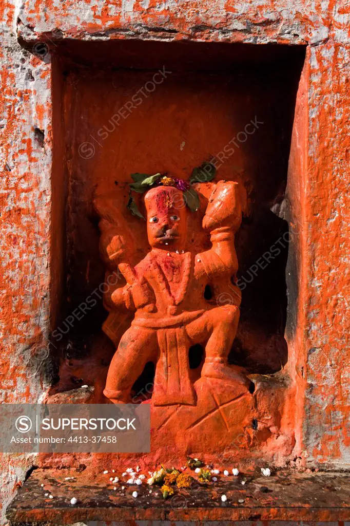 Statue of Hindu God in an alcove Bateshwar temple