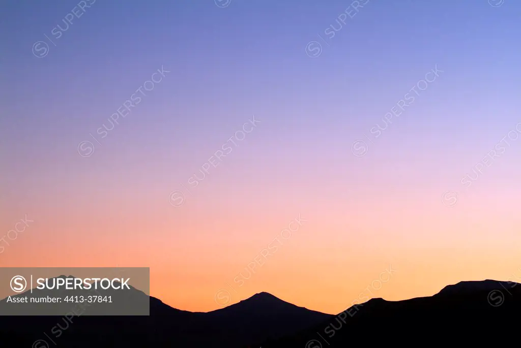 Mounts of Cantal at sunset in the Cantal France