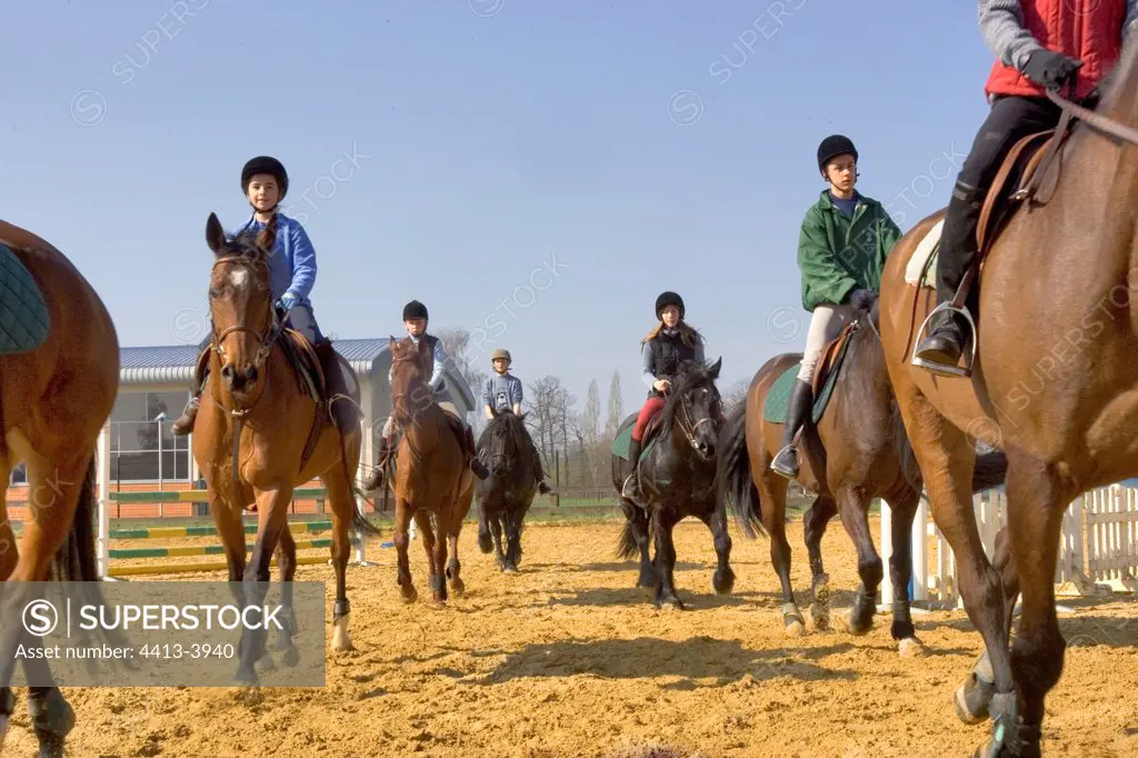Young riders riding in line France