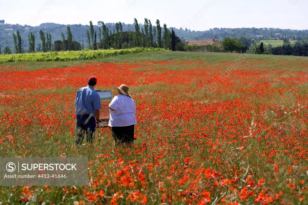 Painters inspired by a field of Poppies Provence