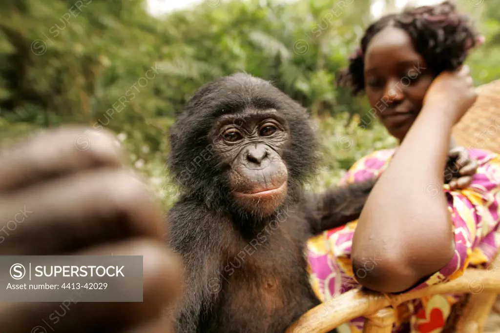 Facetious Bonobo with a young woman