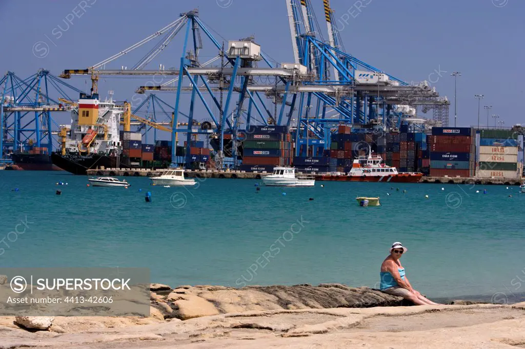 Tourist before the cargo harbour of Benghisa Malta