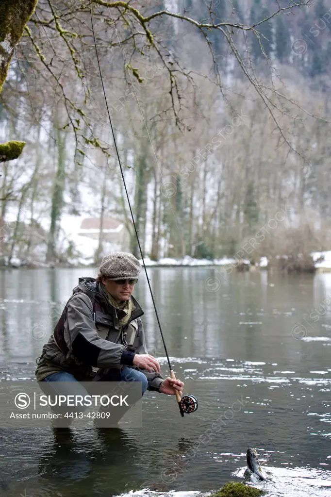 Trout dry fly fishing in early spring France