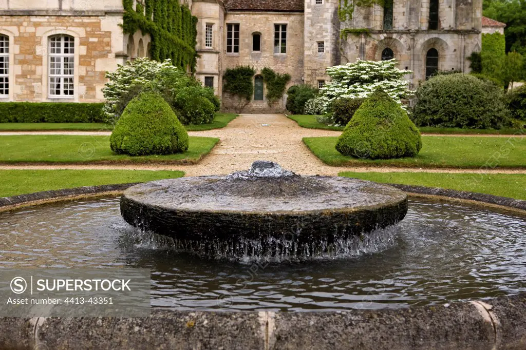 Fountain and pond in the garden of the Abbey of Fontenay