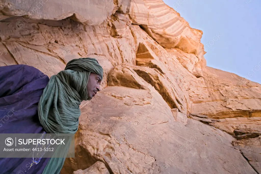 Tuareg near a cliff Tassili N'ajjer Algeria