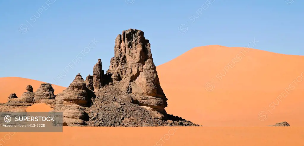 Dunes of Tin Merzouga and solid mass rock Tassili N'ajjer