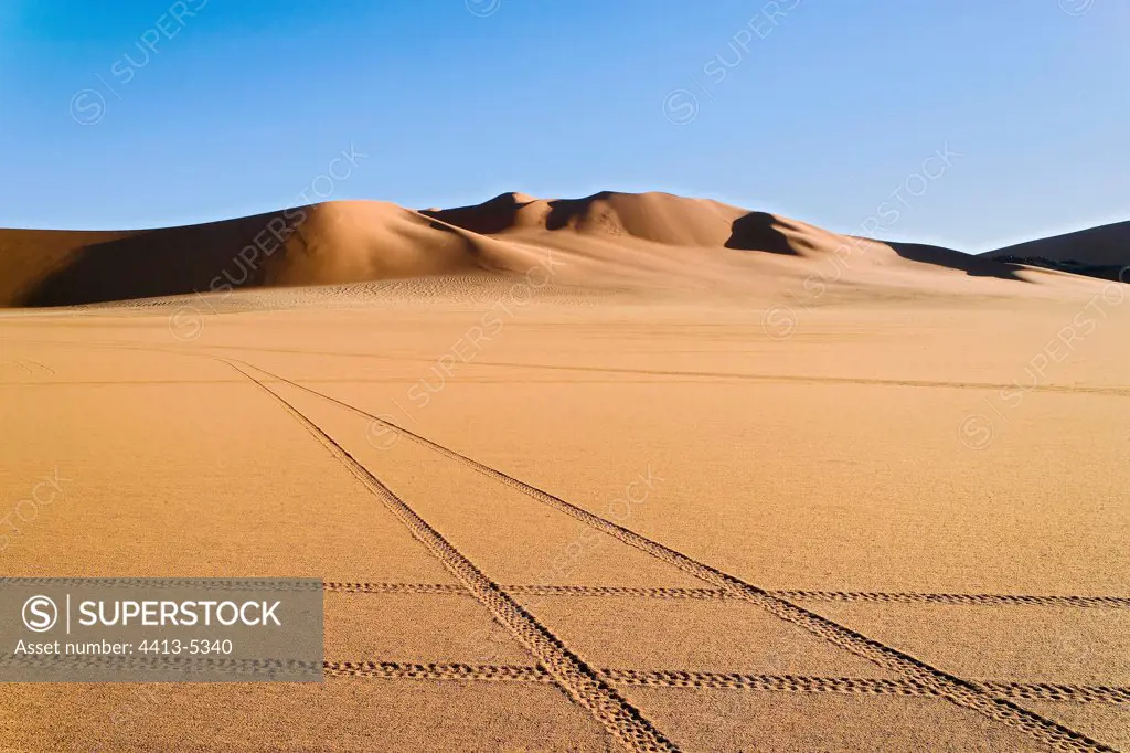 Prints of car close to the Dunes of Tin Merzouga Algeria