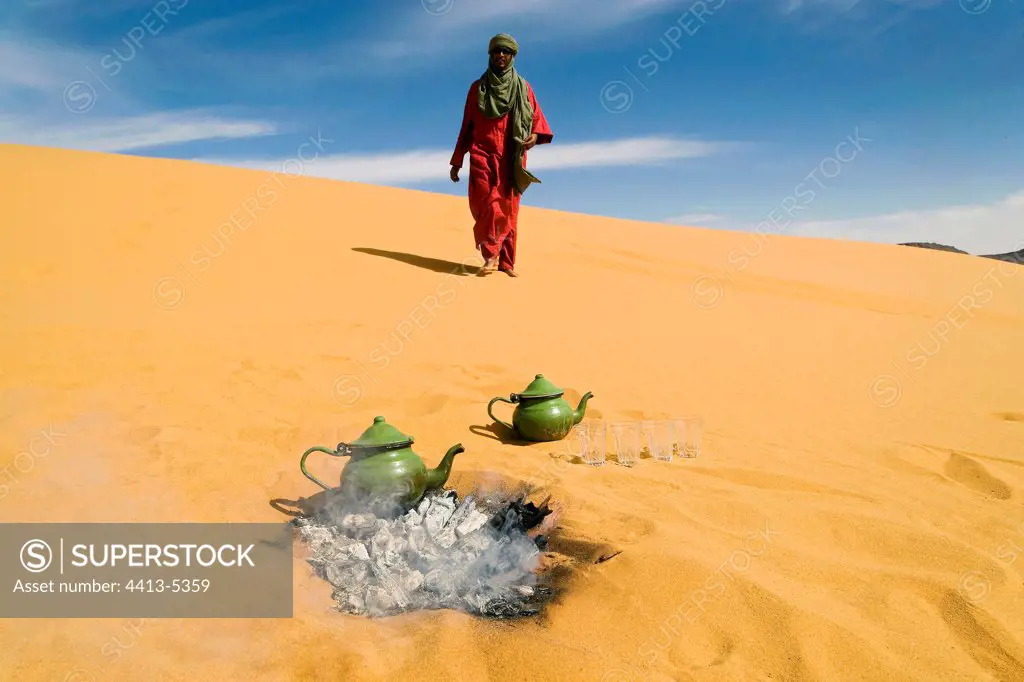 Tuareg going on a sand dune Gandoura Algeria