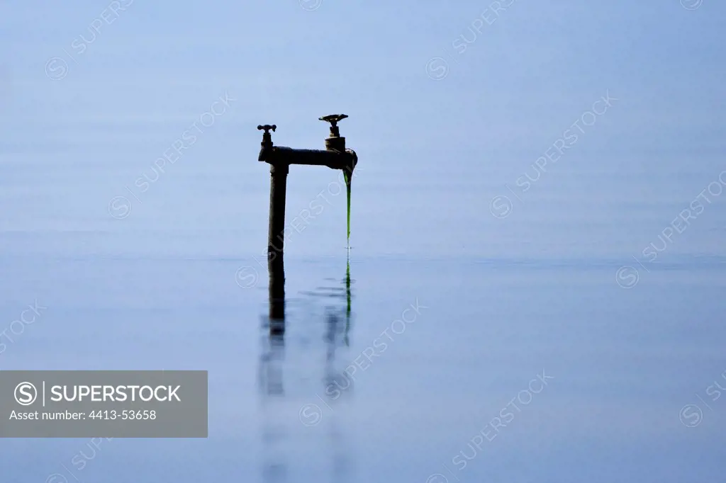 Faucet flowing into a lake Kenya