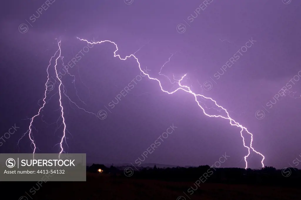 Lightning strikes at night in summer Allier France