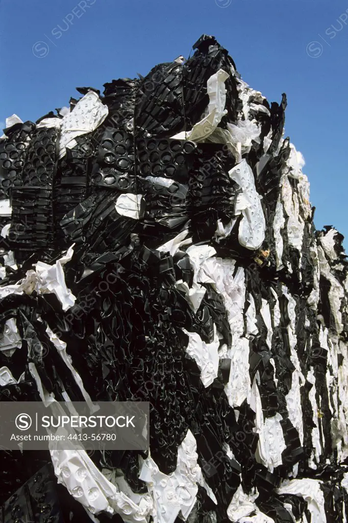 Piles of plastic waste compressed into a sorting center