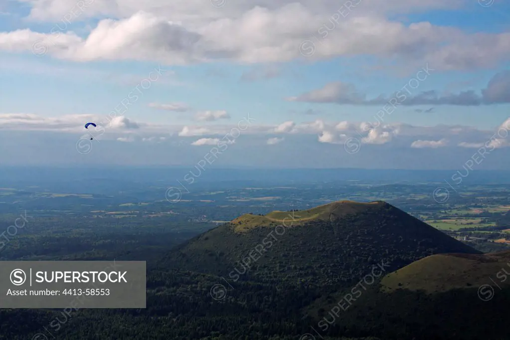 Paragliding over the Puys Mountain Range Auvergne France