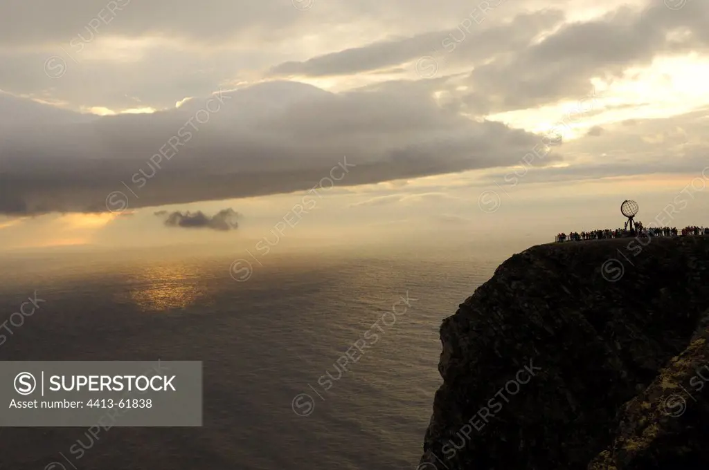 Tourists waiting for the midnight sun in summer solstice