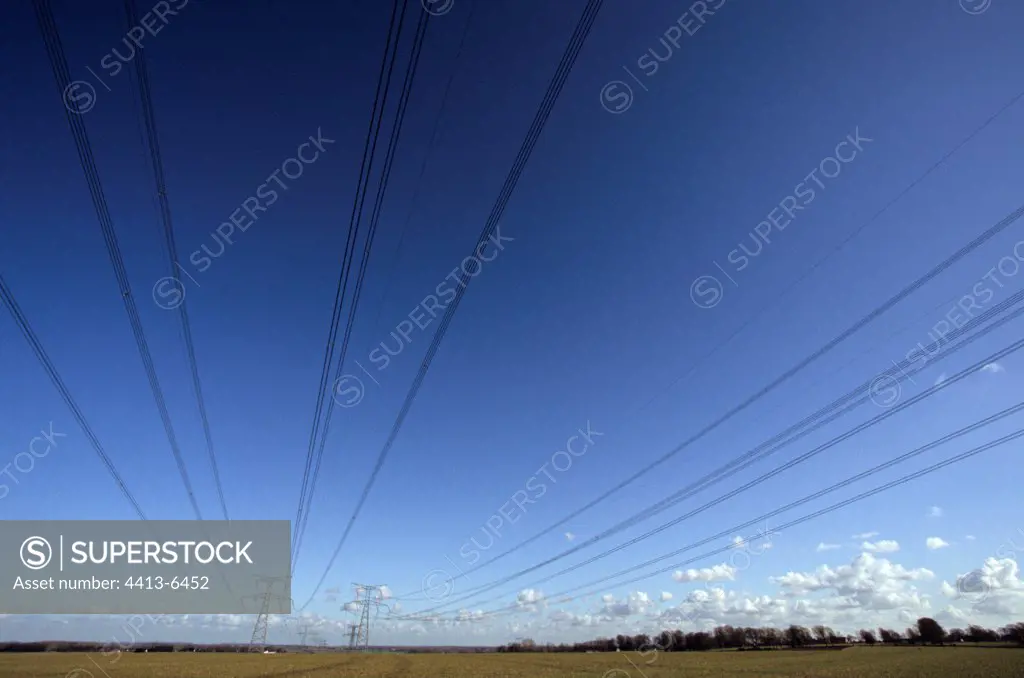 High voltage electricity tower in a field France