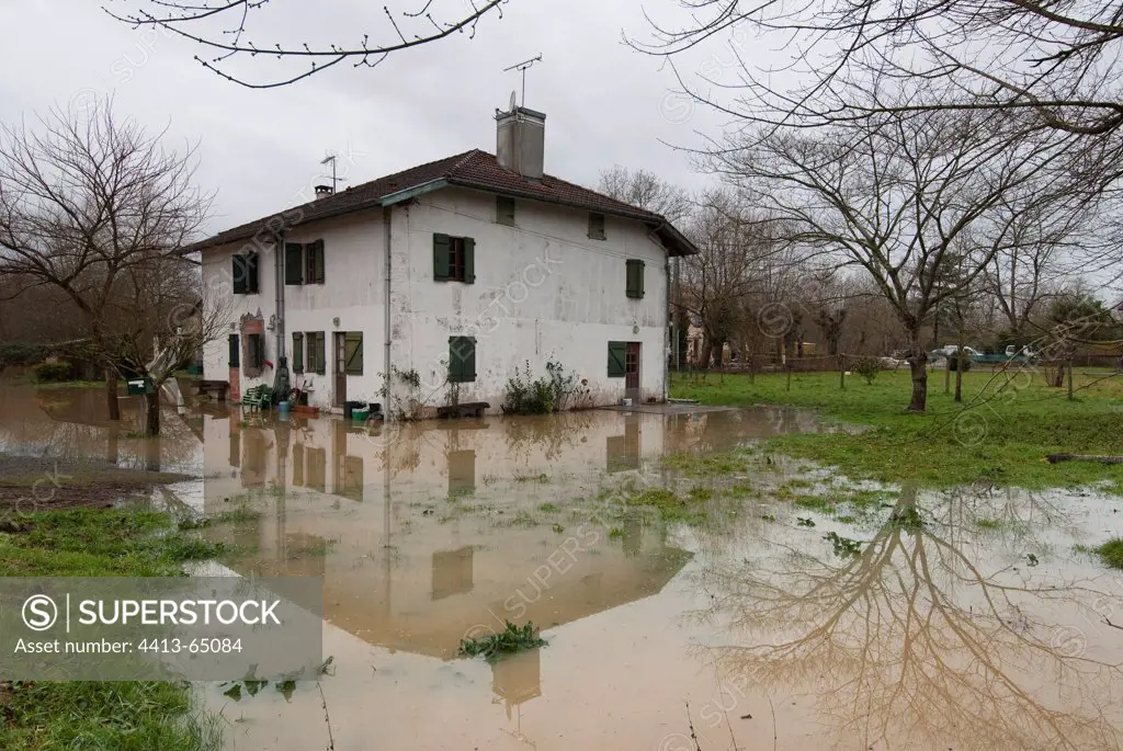 Flooded house during winter storm France