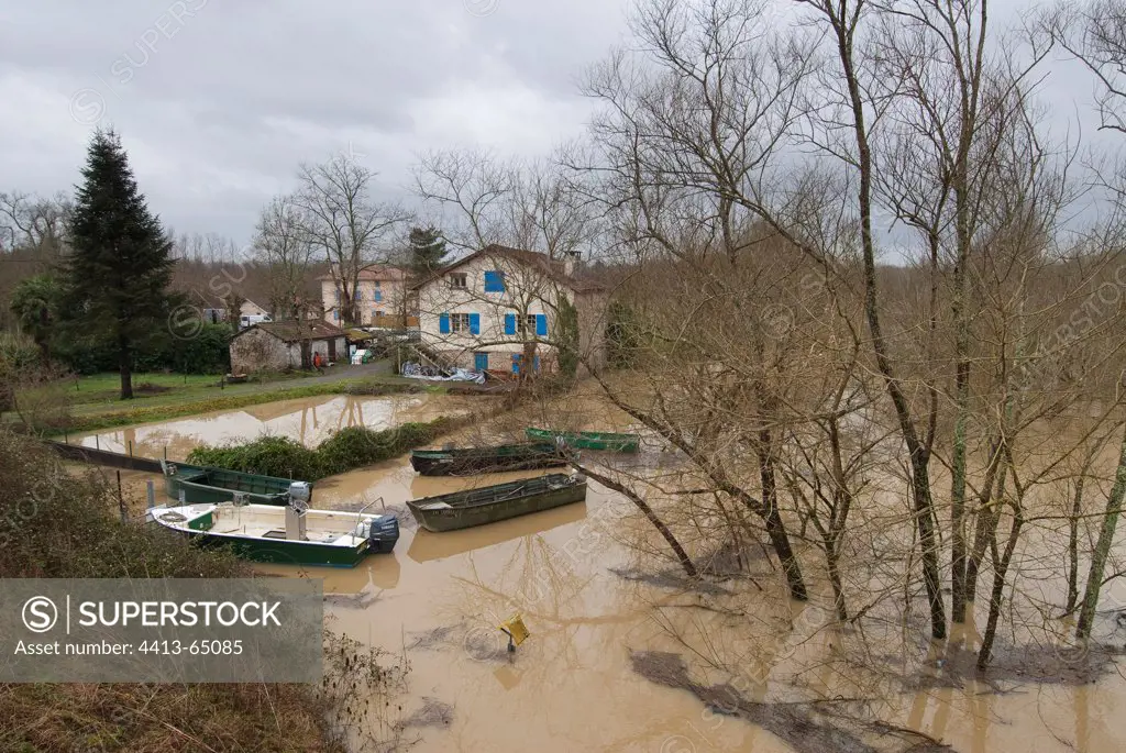 Flooded houses and gardens during winter storm France
