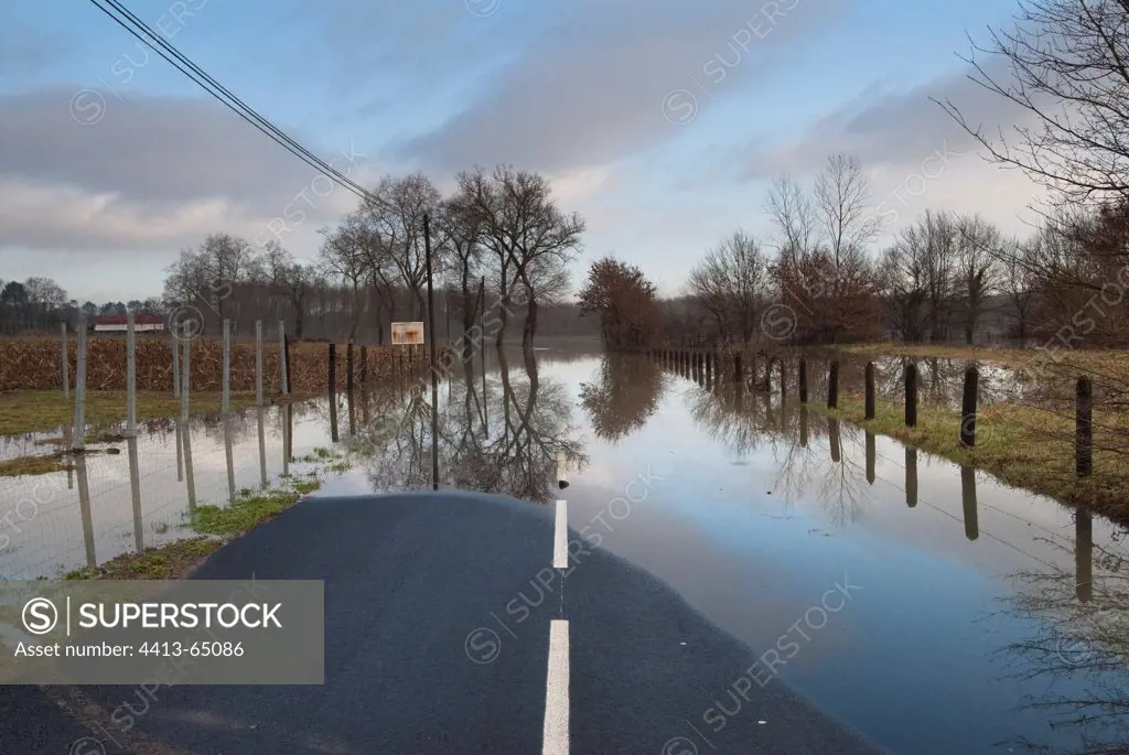 Flooded road during winter storm France