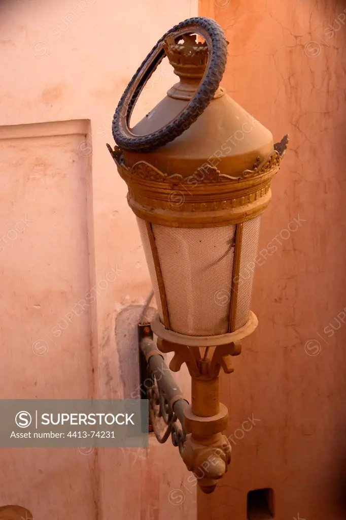Bike tire on a lamp in the medina Marrakech Morocco