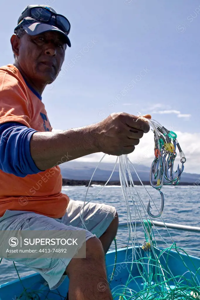 Fisherman hooks and small sharks Isabela Island