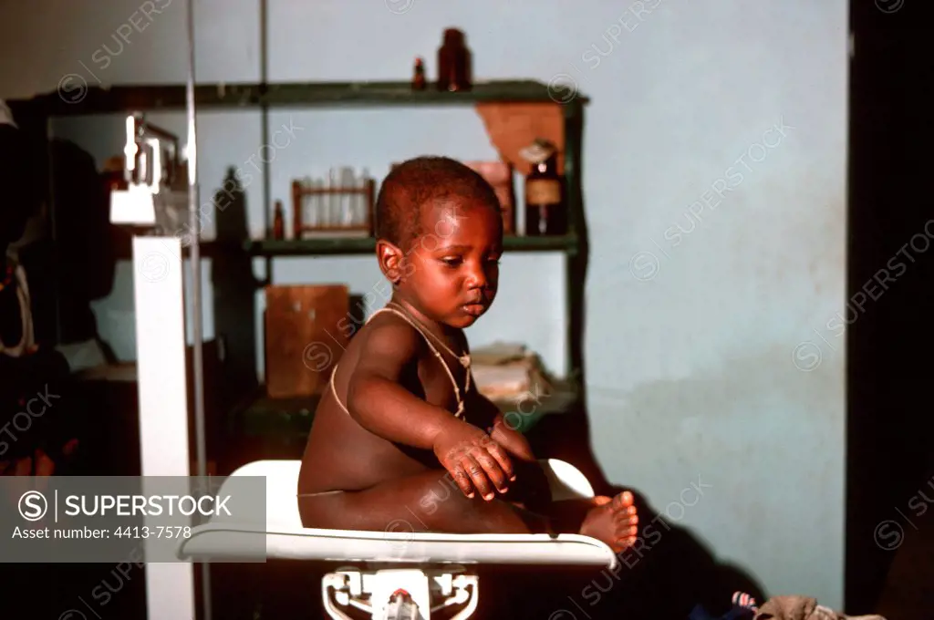 Infant being weighed at Essau Clinic Gambia