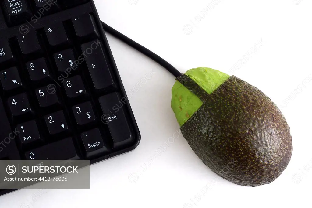 Lawyer shaped computer mouse next to keyboard