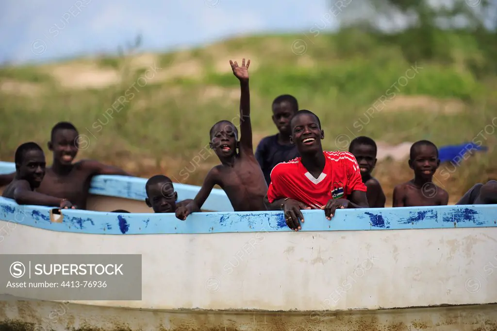 Boys in a canoe Senegal