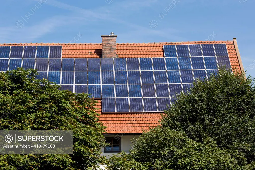 Solar panels on the roof of a mountain chalet