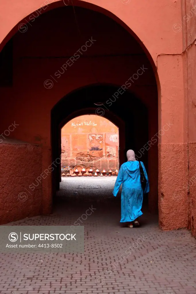 Woman going in the lanes of the Medina Marrakech