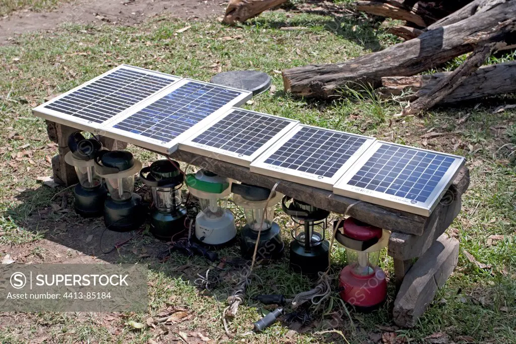 Solar panels charging safari lamps at Duma camp MMNR
