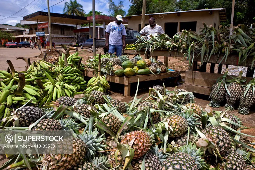 Ananas and green babanas in a market Cameroon