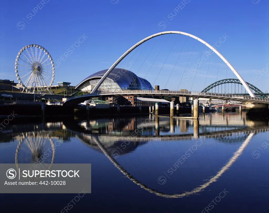 Reflection of a bridge in water, Gateshead Millennium Bridge, Gateshead, England